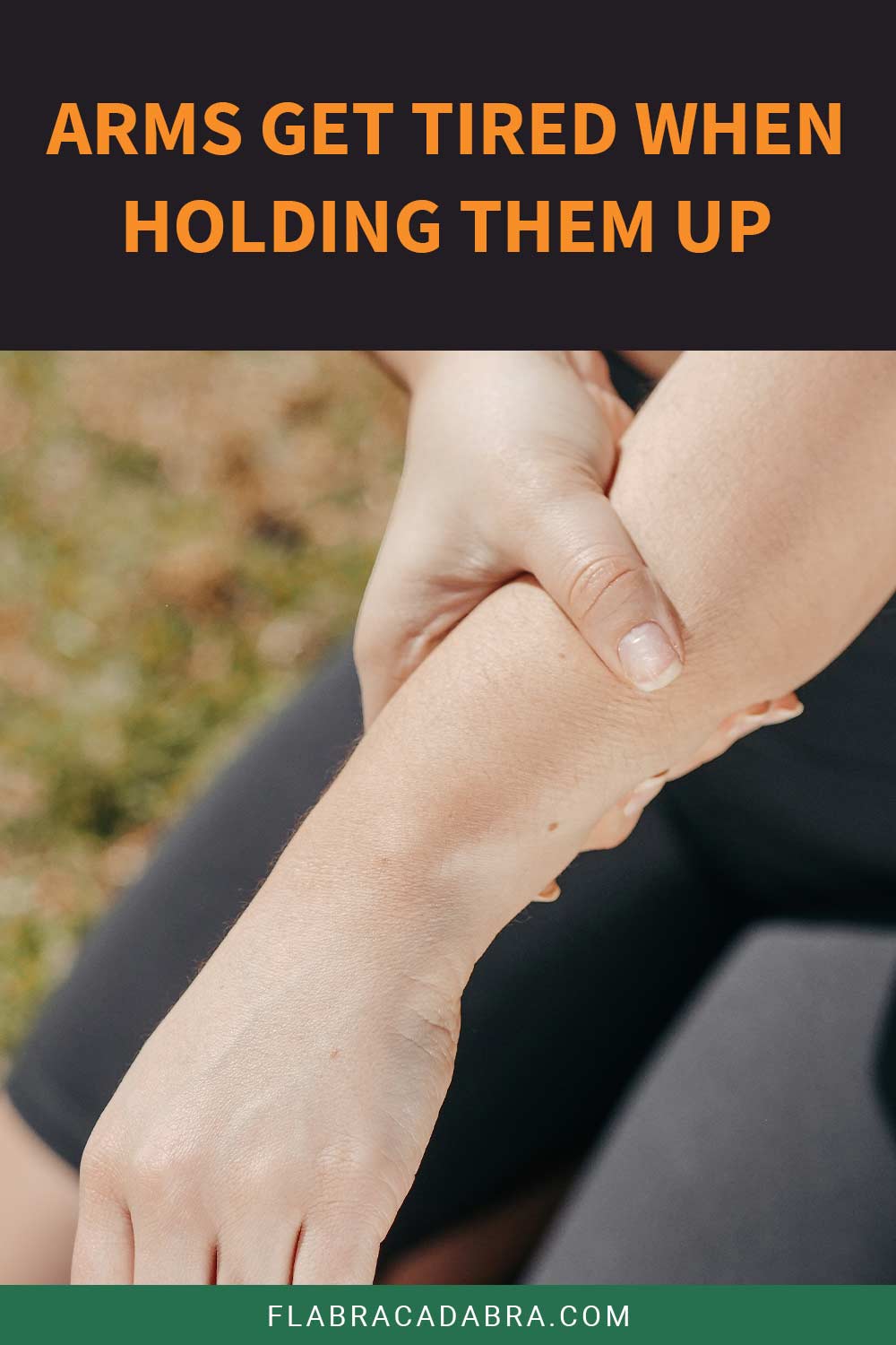 Woman grabbing her left hand with the right hand - Arms Get Tired When Holding Them Up