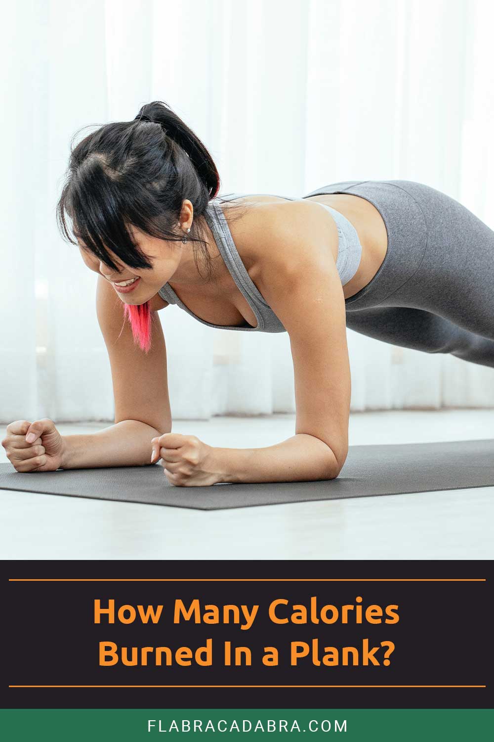Woman doing plank on a grey yoga mat - How Many Calories does doing it burn?