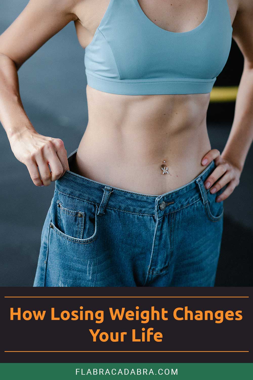 Woman stretching her jeans pant's waist - Losing Weight Changes Your Life.